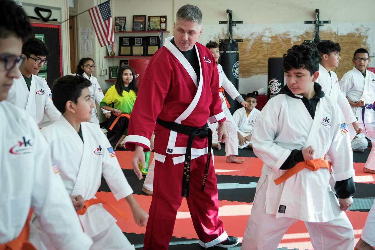 Roy White works with his students during a karate class at Burbank Middle School on Wednesday, Dec. 18, 2019, in Houston. HISD has had karate in schools for more than 25 years, becoming one of the largest operators of the Kickstart Kids program.
