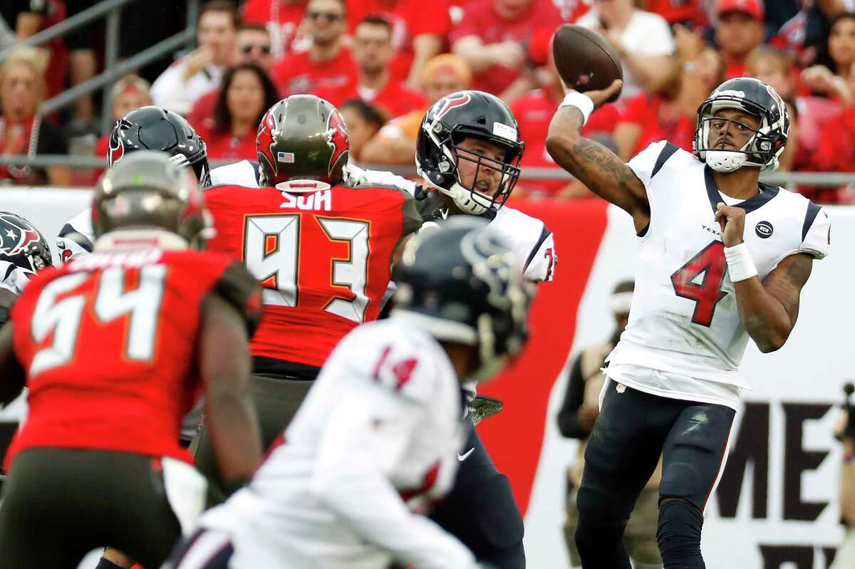Houston Texans quarterback Deshaun Watson (4) throws a pass against the Tampa Bay Buccaneers defense during the second quarter of an NFL football game at Raymond James Stadium on Saturday, Dec. 21, 2019, in Tampa.