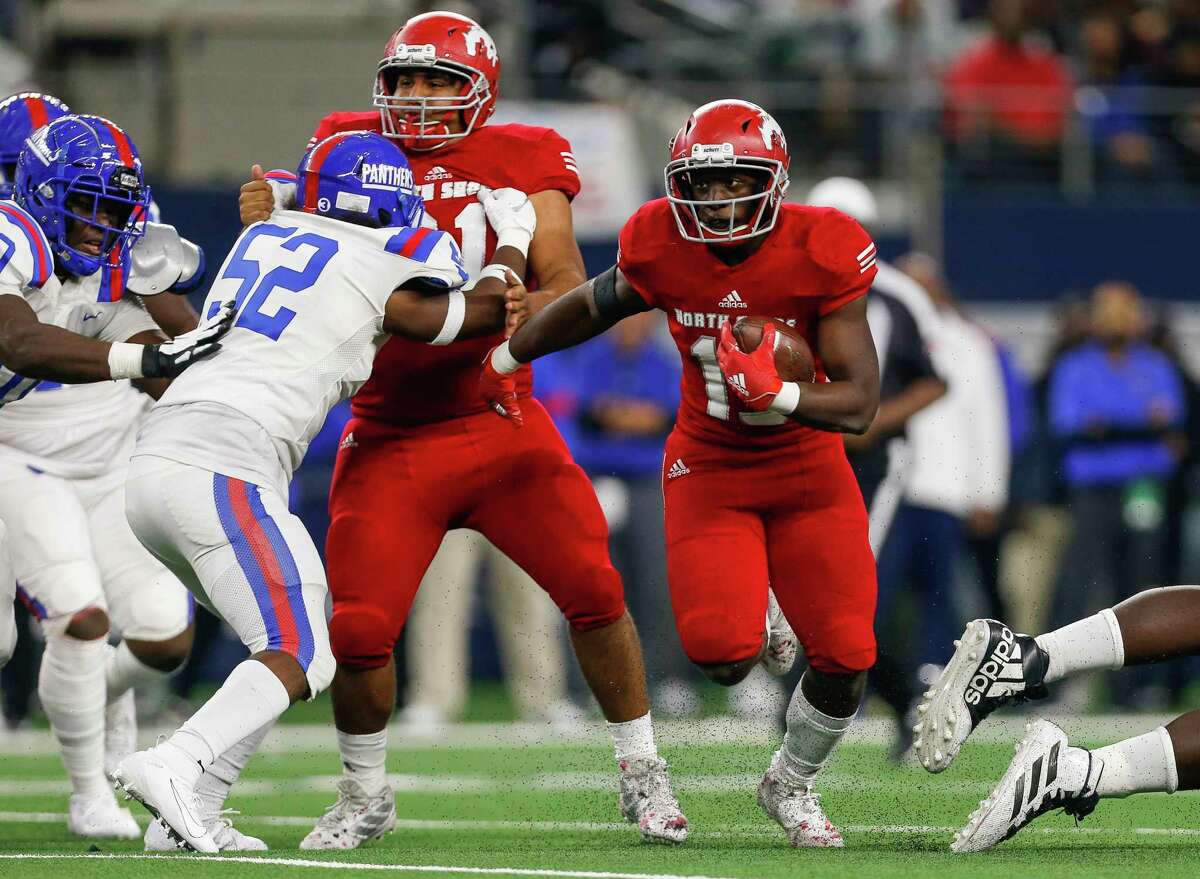 PHOTOS: North Shore vs. Duncanville  North Shore running back Roger Hagan (15) runs the ball against Duncanville during the first quarter of the UIL 6A Division 1 State Championship at AT&T Stadium Saturday, Dec. 21, 2019, in Arlington, Texas.