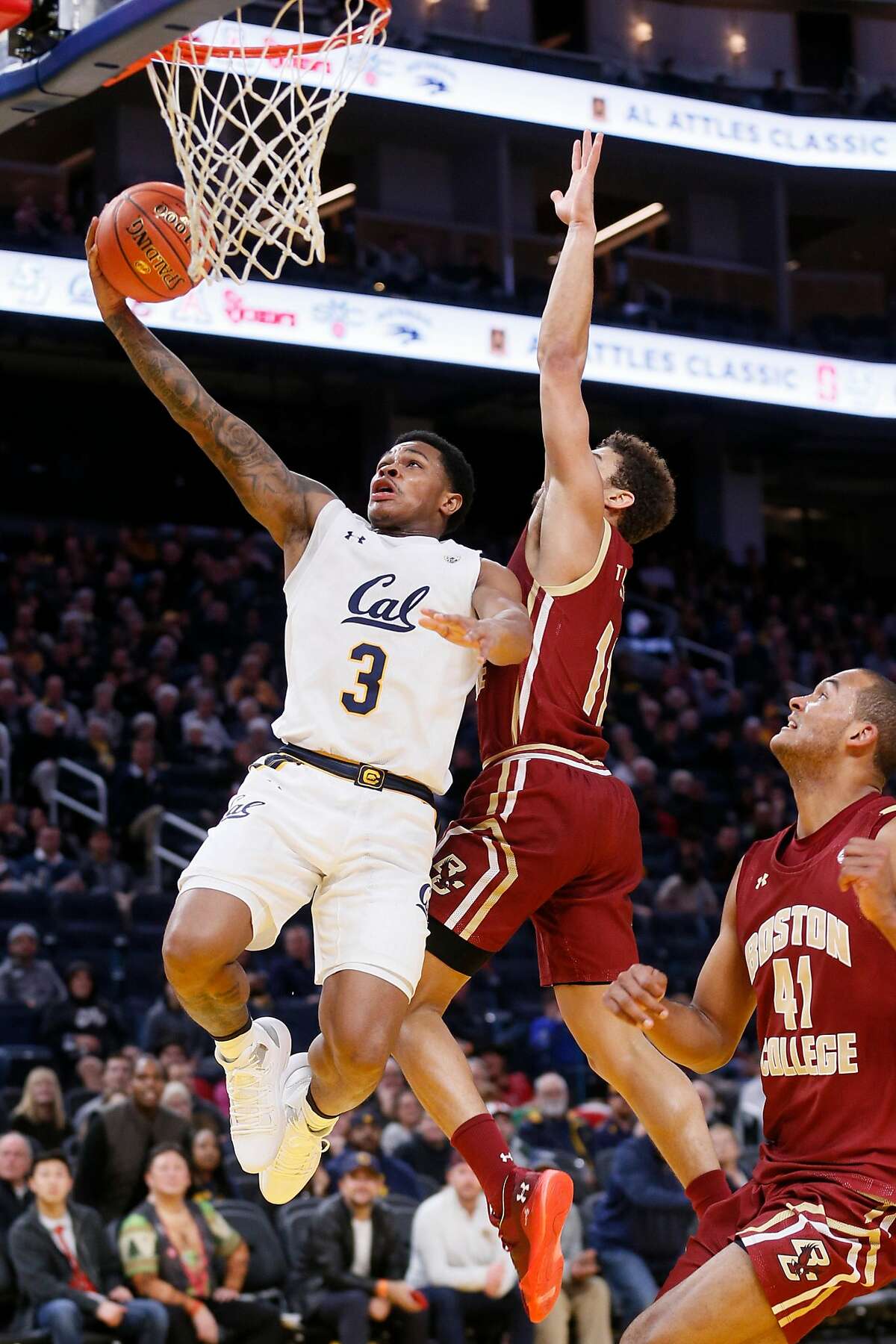 California Golden Bears guard Paris Austin (3) scores against Boston College Eagles guard Derryck Thornton (11) in Session 1 of the Al Attles Classic at Chase Center on Tuesday, Dec. 26, 2019, in San Francisco, Calif.