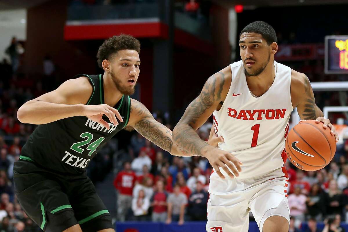 DAYTON, OHIO - DECEMBER 17: Obi Toppin #1 of the Dayton Flyers drives to the basket while being guarded by Zachary Simmons #24 of the North Texas Mean Green during the second half at UD Arena on December 17, 2019 in Dayton, Ohio. (Photo by Justin Casterline/Getty Images)