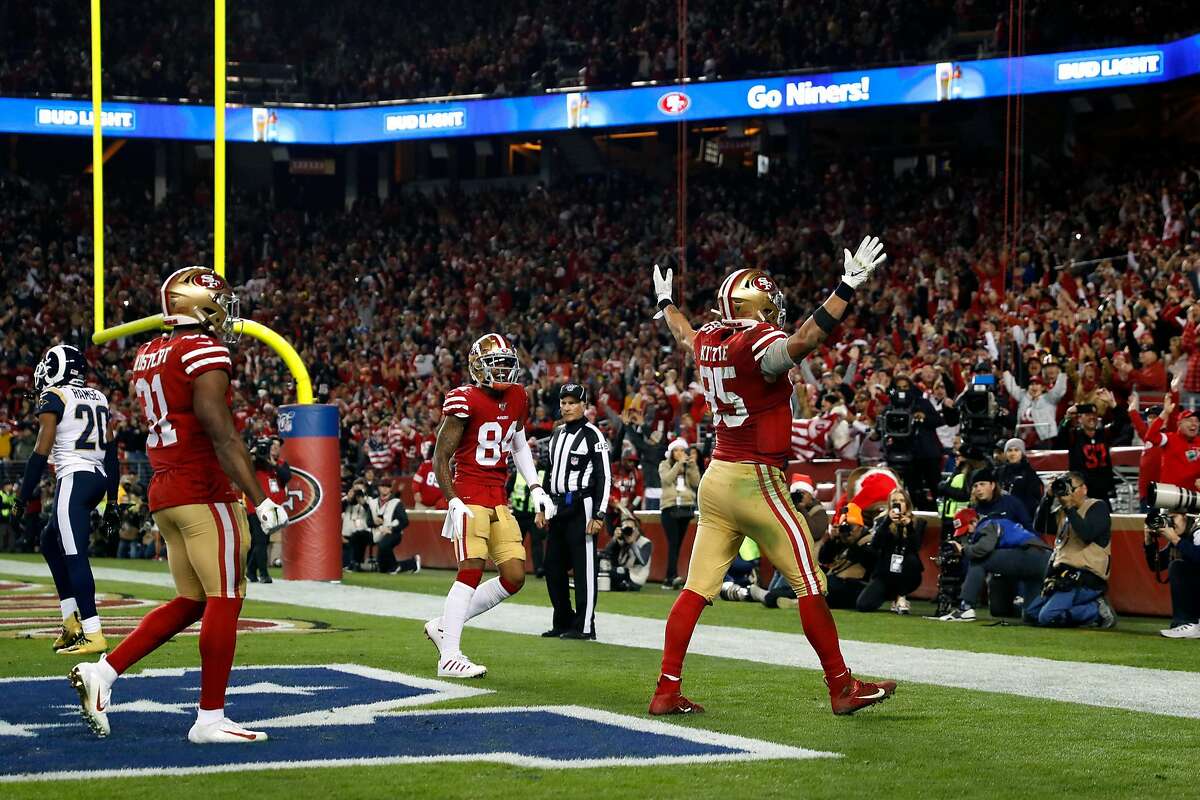 San Francisco 49ers' George Kittle celebrates his 4th quarter touchdown catch during Niners' 34-31 win over Los Angeles Rams in NFL game at Levi's Stadium in Santa Clara, Calif., on Saturday, December 21, 2019.
