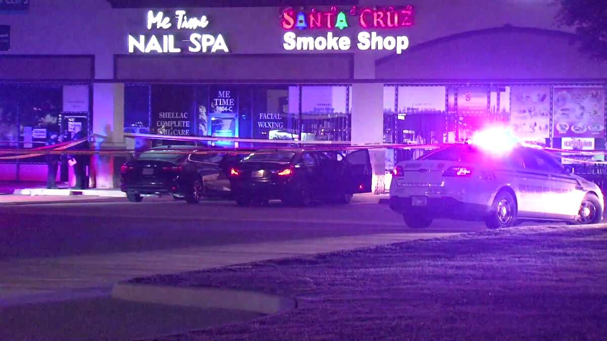 Two men were shot to death in a car parked outside a north Houston bar and one man was injured, according to the Harris County Sheriff’s Office.