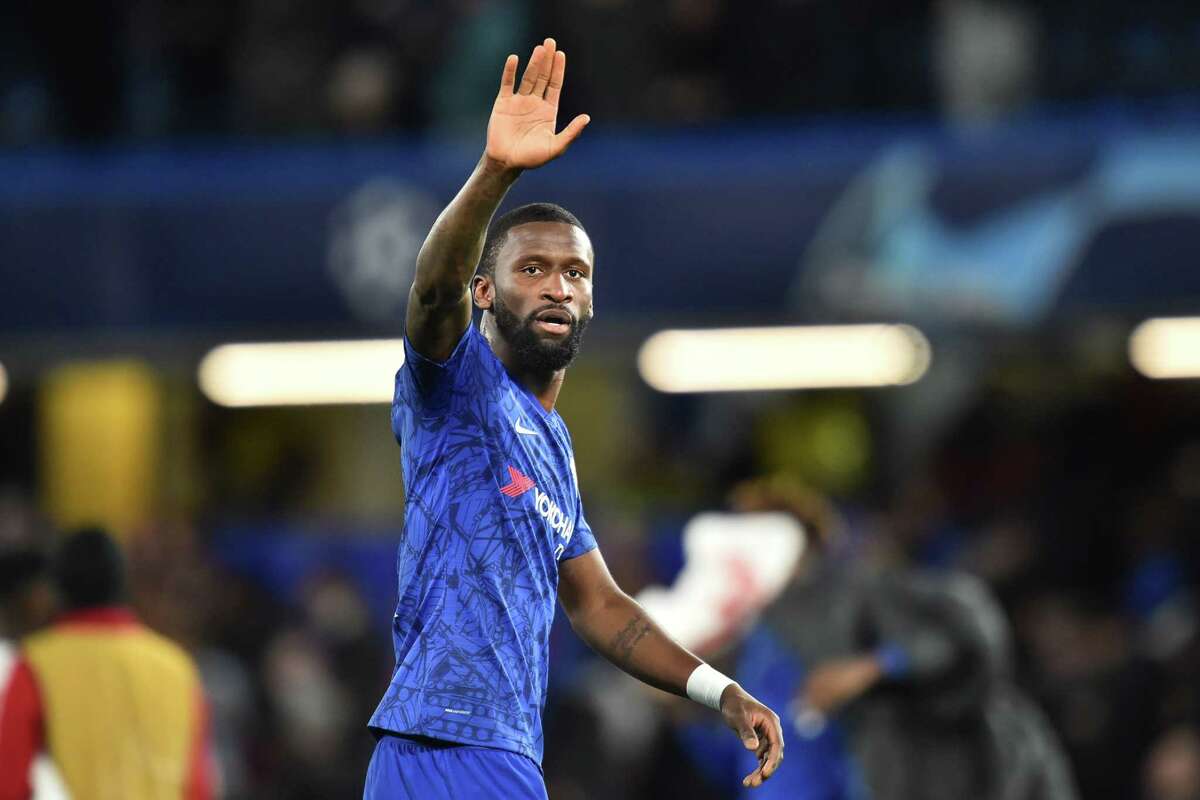 Chelsea's German defender Antonio Rudiger gestures on the pitch after the UEFA Champion's League Group H football match between Chelsea and Lille at Stamford Bridge in London on December 10, 2019. - Chelsea won the game 2-1, and qualified for the knock-out stages. (Photo by Glyn KIRK / AFP) (Photo by GLYN KIRK/AFP via Getty Images)