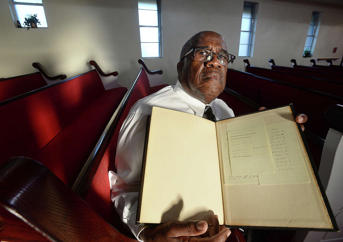 Rev. Kenneth Lyons sits with the Bible he uses for preaching at Greater New Bethel Baptist Church in Jasper. Photo taken Tuesday, April 9, 2019 Kim Brent/The Enterprise