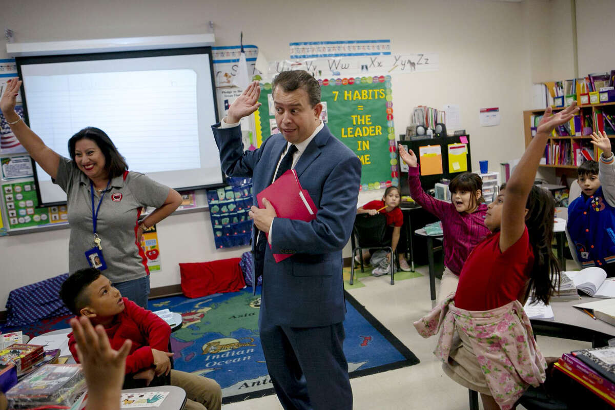 SAISD Superintendent Pedro Martinez waits for guesses after asking a classroom of second graders how many children are in the school district as he visits Hawthorne Academy in San Antonio on Oct. 29, 2019.