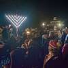 Rabbi Shneur Brook of Chabad of Shelton & Monroe speaks to those gathered at the annual menorah lighting celebration held last year on the Huntington Green. This year’s celebration will be Sunday, Dec. 13, on the green.
