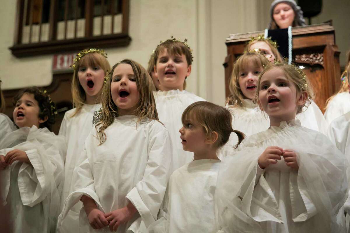 Children dressed as angels sing during the Christmas pageant at St. Mark's United Methodist Church on Saturday, Dec. 21, 2019.