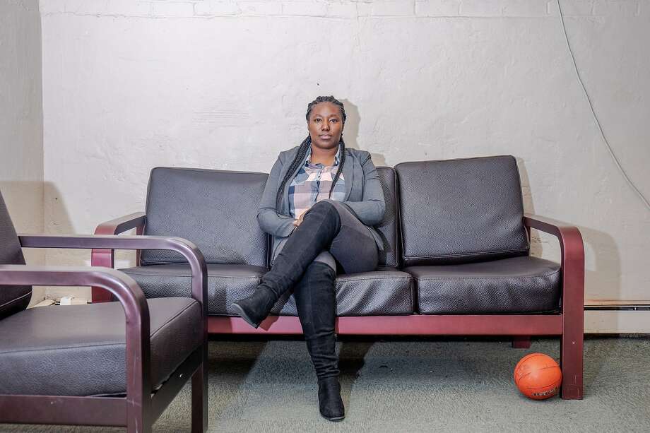 November 20 2019. Queens New York. Site Director Fatima Campbell poses for a portrait in the basement rec room at the Astoria location.   In New York City, some youth home programs offer alternatives to youth incarceration, in an attempt to create a rehabilitation as opposed to punitive model for youth in the criminal justice system. On Tuesday afternoon, the Chronicle was given a tour of two Sheltering Arms shelter locations in Queens New York. Photo: Natalie Keyssar / Special To The Chronicle