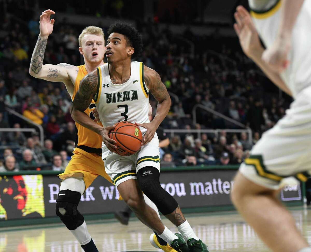 Siena's Manny Camper drives to the hoop against Canisius during a basketball game on Monday, Dec. 23, 2019 in Albany, N.Y. (Lori Van Buren/Times Union)