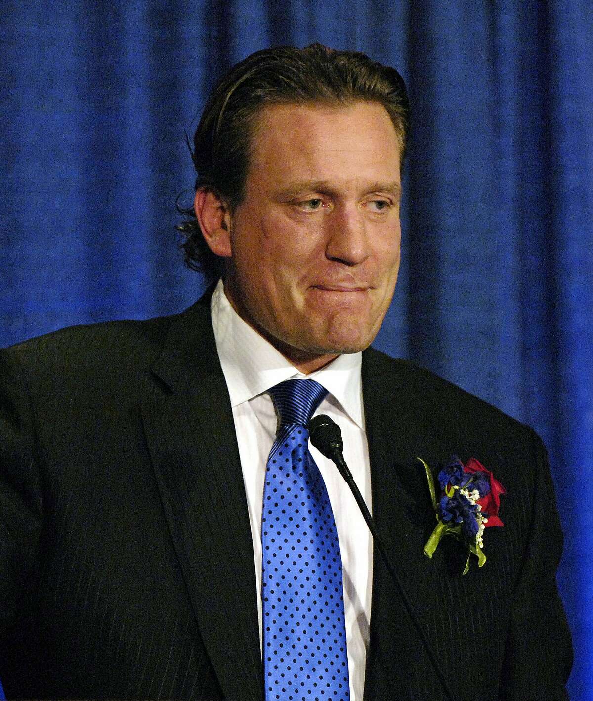 File- This Oct. 21, 2010, file photo shows Jeremy Roenick speaking during induction ceremonies for the U.S. Hockey Hall of Fame in Buffalo, N.Y. NBC Sports has suspended former NHL player Jeremy Roenick indefinitely for making inappropriate comments about co-workers. The network announced the suspension Monday, Dec. 23, 2019. (AP Photo/Don Heupel, File)
