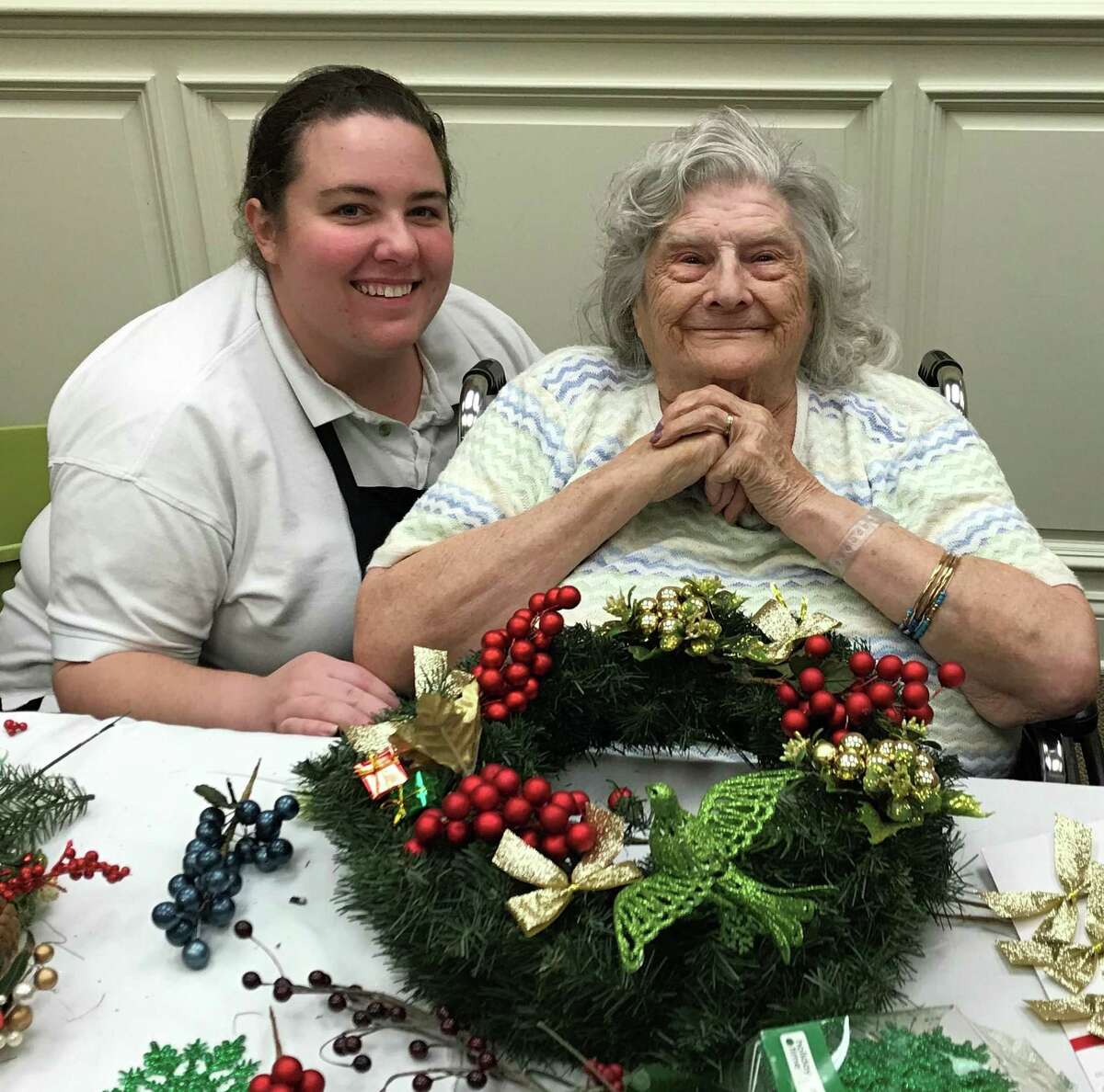 Popcorn garland stations, cookie recipes and holiday greetings for the troops are all part of this year’s holiday celebration at Bishop Wicke Health and Rehabilitation Center on the Wesley Village campus in Shelton.
