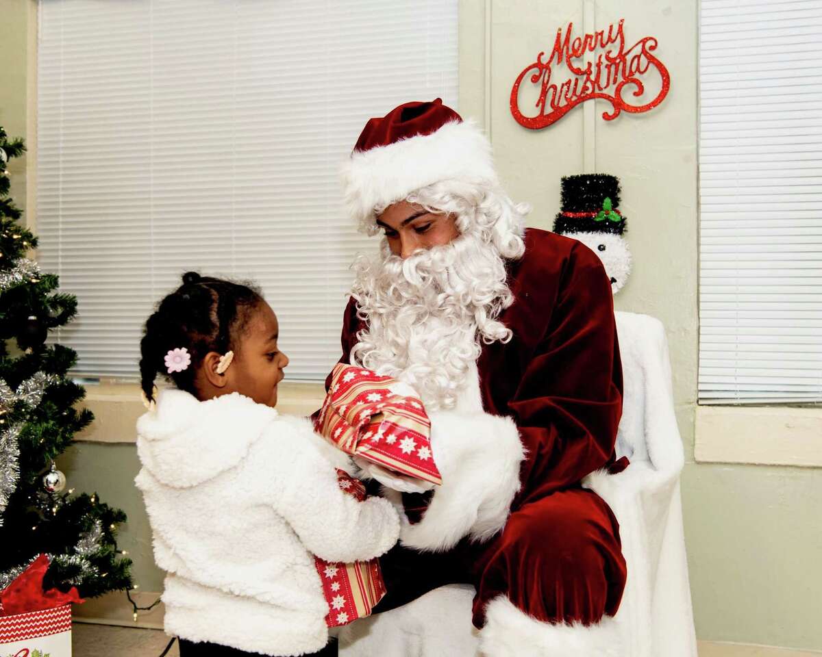 Spurs guard Bryn Forbes played Santa Claus at a recent Elf Louise Christmas project.