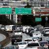 SAN FRANCISCO, CALIFORNIA - NOVEMBER 27: Traffic moves along U.S. Highway 101 towards downtown San Francisco on November 27, 2019 in San Francisco, California. Nearly 50 million people are expected to hit the roadways this Thanksgiving holiday season, the highest number since 2005 and a record 31.6 million travelers are expected to take to the skies on U.S. airlines, up 3.7% from last year. (Photo by Justin Sullivan/Getty Images)