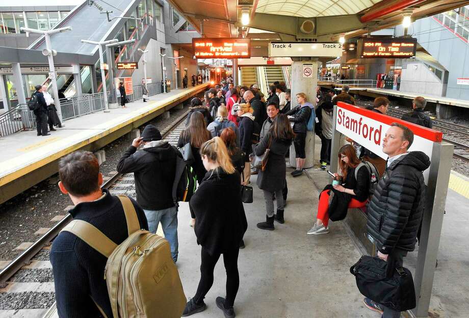 U.S. companies are paying less to help persuade employees to switch jobs, according to new research from Stamford-based IT consulting and research firm Gartner. Photo: Matthew Brown / Hearst Connecticut Media / Stamford Advocate