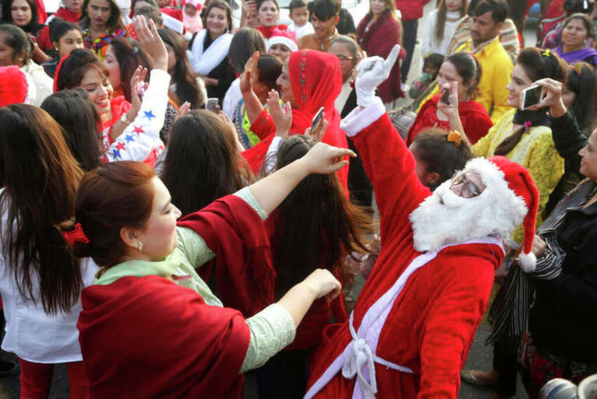 Pakistan Christians celebrate ahead of the Christmas holiday in Lahore, Pakistan. (AP Photo/K.M. Chaudary)