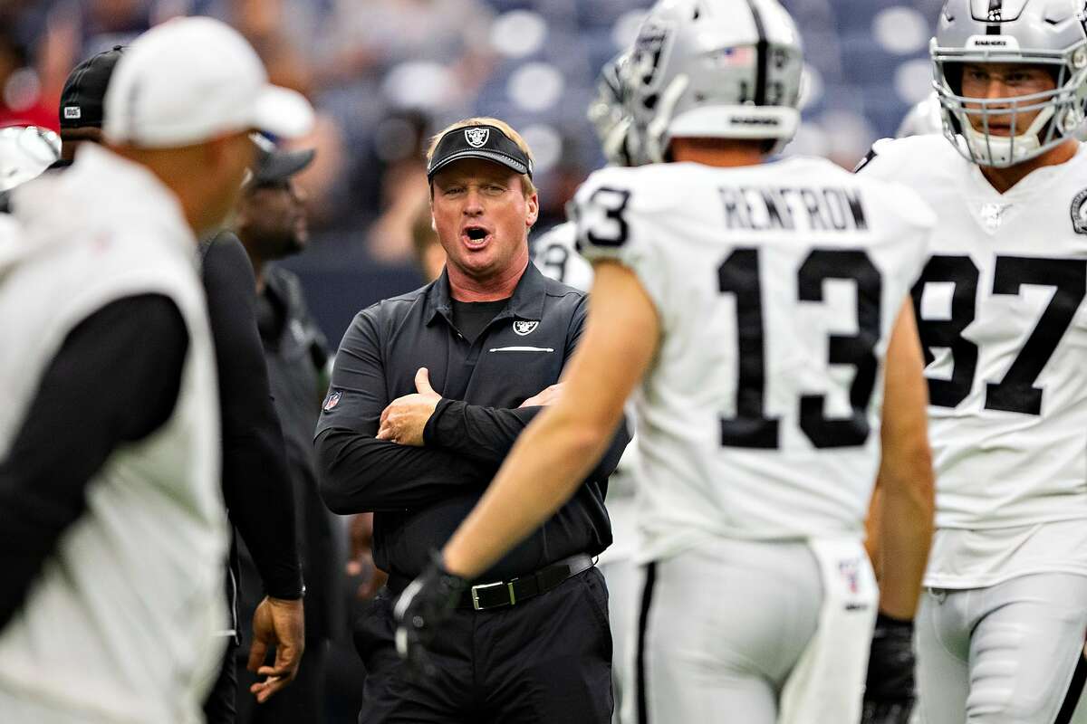 HOUSTON, TX - OCTOBER 27: Head Coach Jon Gruden of the Oakland Raiders watches his team warm up before a game against the Houston Texans at NRG Stadium on October 27, 2019 in Houston, Texas. The Texans defeated the Raiders 27-24. ~~