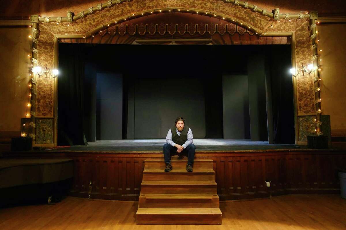 David Snider, the artistic director, of Hubbard Hall, sits on the stage inside the hall on Monday, Dec. 16, 2019, in Cambridge, N.Y. (Paul Buckowski/Times Union)