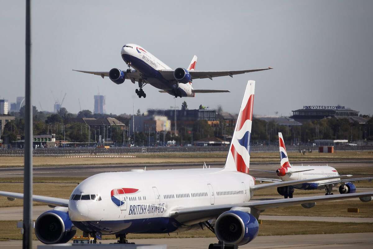 In this file photo taken on Sept. 13, 2019, a British Airways airplane takes off from the runway at Heathrow Airport.