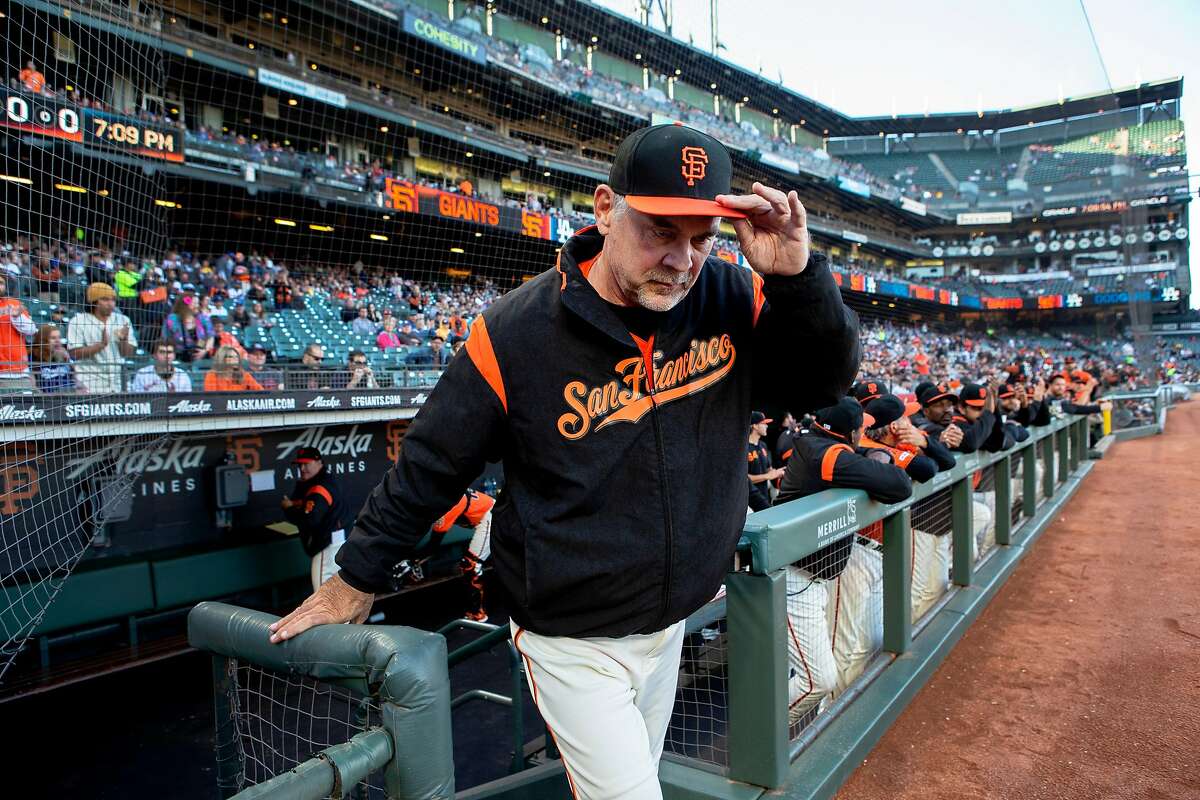 San Francisco Giants manager Bruce Bochy tips his hat as he�s honored for his 1,000th win before an MLB game against the Los Angeles Dodgers on Friday, June 7, 2019, in San Francisco, Calif. Bochy got his 1,000th win against the New York Mets on June 4 at Citi Field in New York City. The Giants won 2-1 against the Dodgers tonight for Bochy�s 1,001 win.