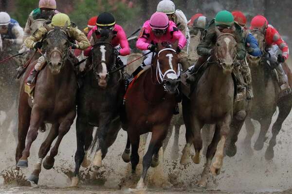 FILE - In this May 4, 2019, file photo, front row from left: Flavien Prat on Country House, Tyler Gaffalione on War of Will, Luis Saez on Maximum Security and John Velazquez on Code of Honor compete in the 145th running of the Kentucky Derby horse race at Churchill Downs in Louisville, Ky. (AP Photo/John Minchillo, File)