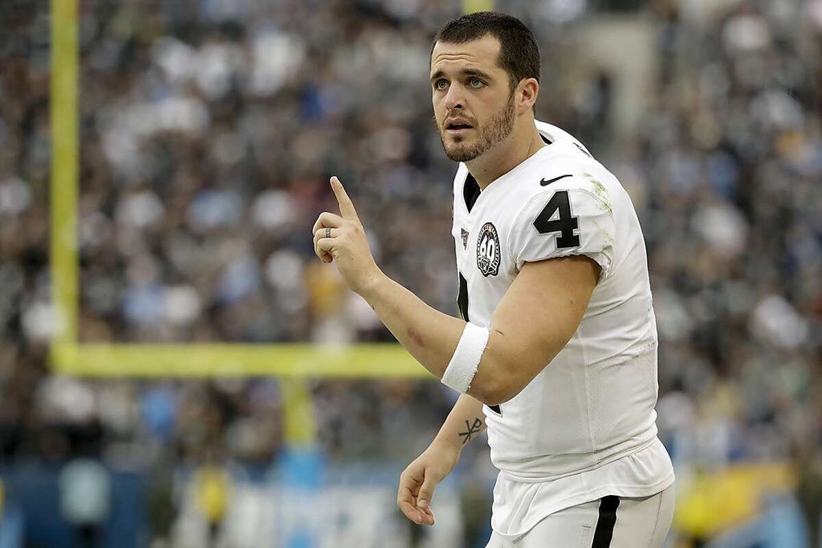 Oakland Raiders quarterback Derek Carr gestures during the second half of an NFL football game against the Los Angeles Chargers Sunday, Dec. 22, 2019, in Carson, Calif. (AP Photo/Marcio Jose Sanchez)