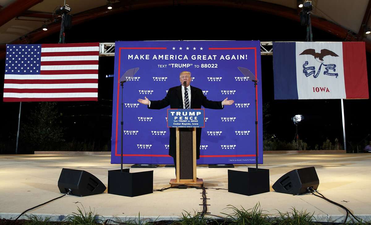FILE - In this Oct. 28, 2016, file photo, then-Republican presidential candidate Donald Trump speaks during a campaign rally in Cedar Rapids, Iowa. Few states have changed politically with the head-snapping speed of Iowa. (AP Photo/ Evan Vucci, File)
