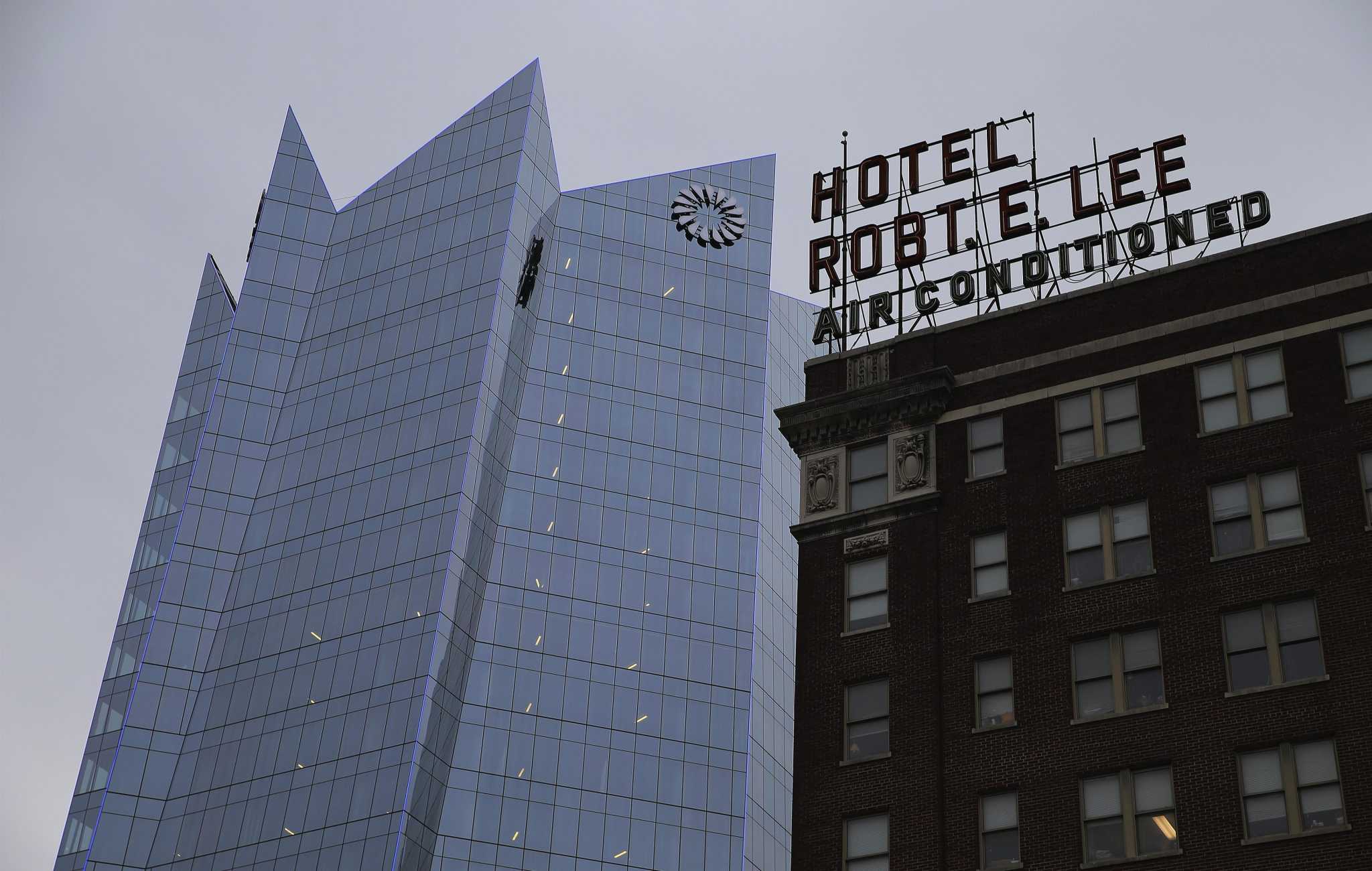 The new glass buildings of San Antonio’s downtown and Midtown signal a