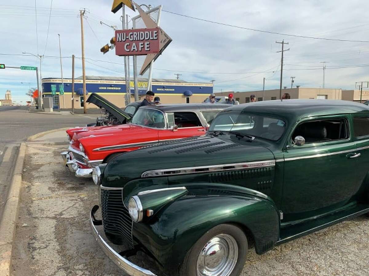 Antique cars were on display at the Nu-Griddle Café Tuesday as part of a revived tradition to host an antique car show at the restaurant on Christmas Eve.