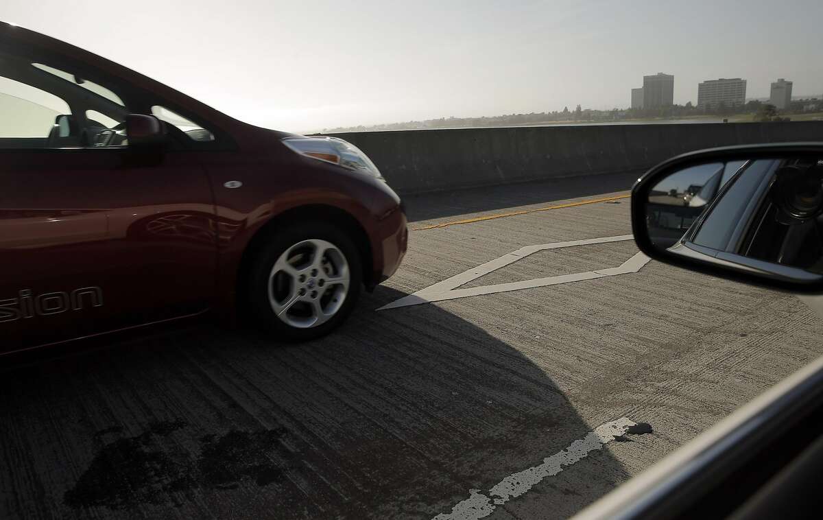 A driver uses the carpool lane on the flyover between I-800 and I-80 in Emeryville, Calif., on Tuesday, May 10, 2016.