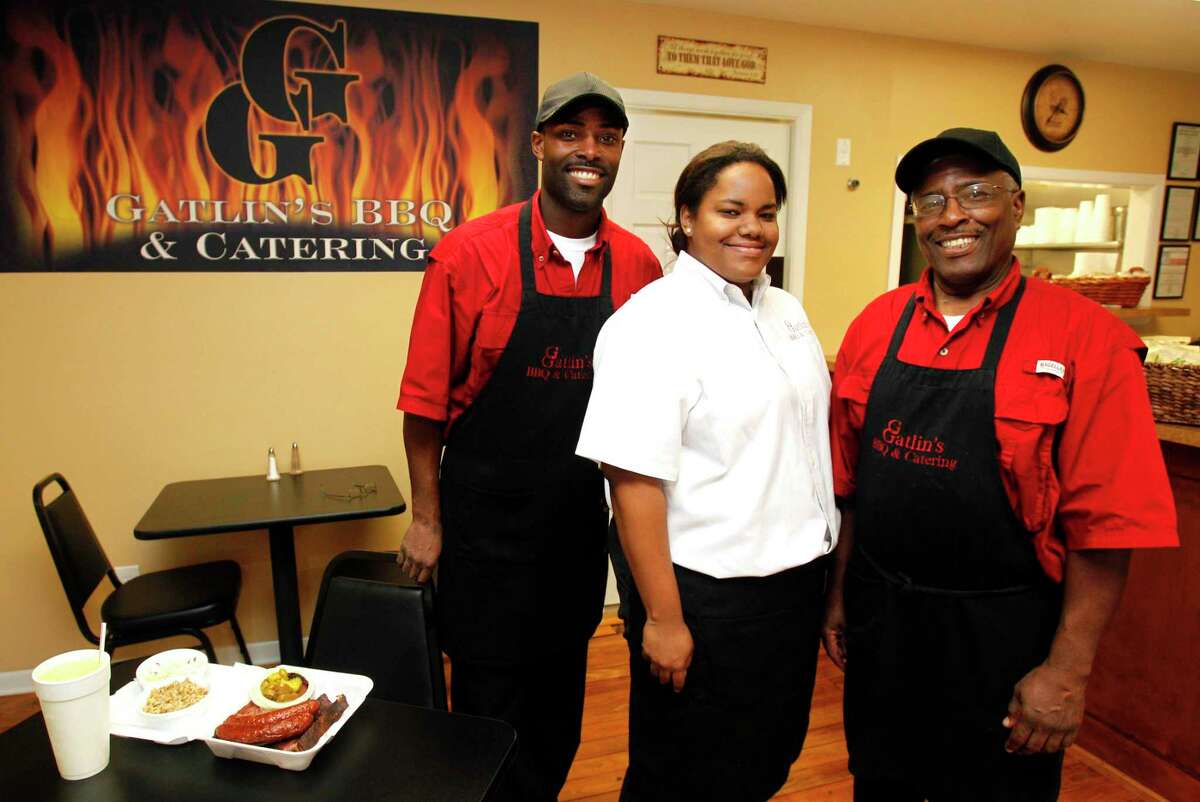 Greg Gatlin, left, his sister, Austin Smith, and their dad, Henry Gatlin, right, at Gatlin’s BBQ & Catering, 1221 W. 19th, Wednesday, Nov. 3, 2010, in Houston.)