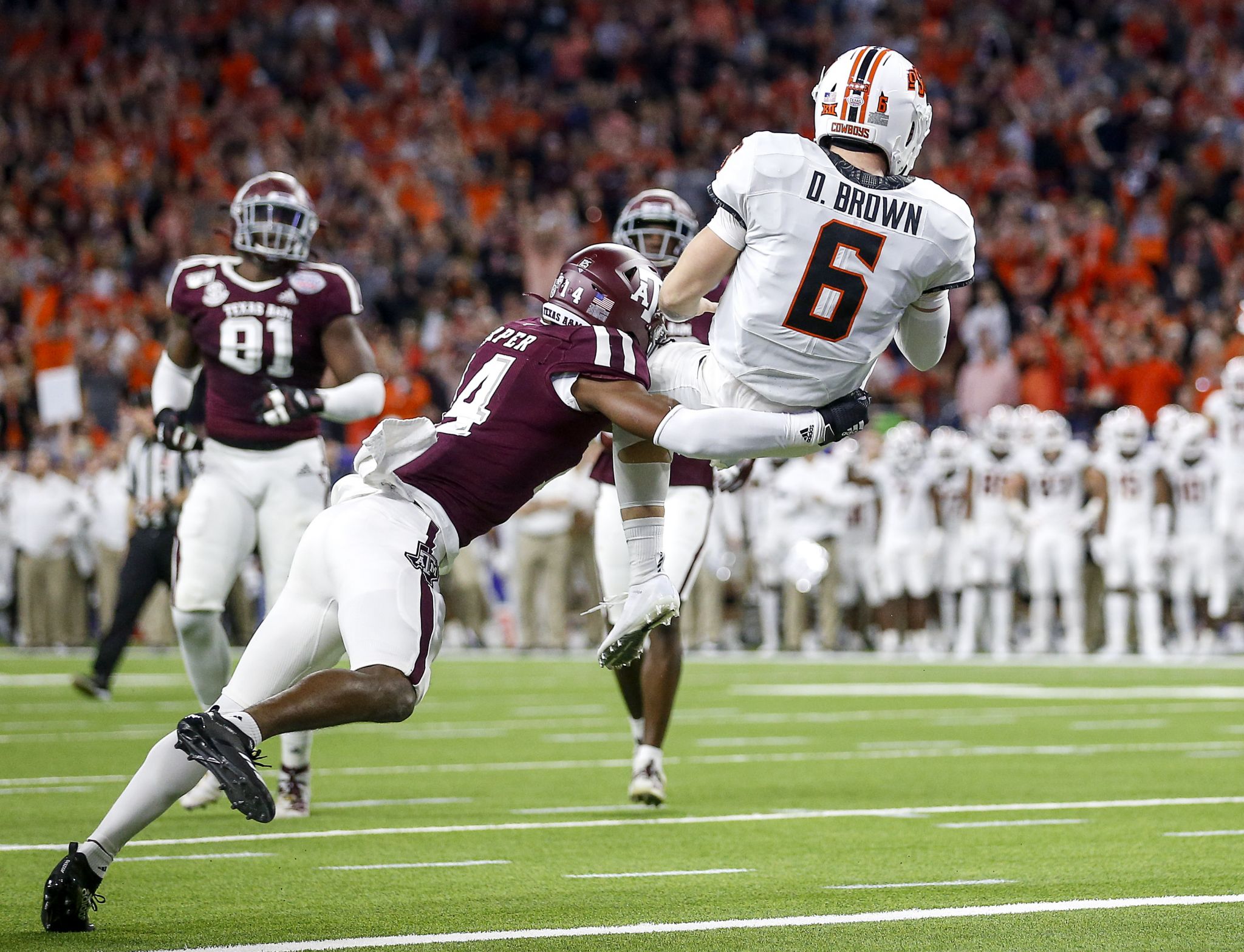 Photos: Kellen Mond dons cowboy hat, Texas A&M players give Jimbo Fisher a  Gatorade bath after Texas Bowl win vs. Oklahoma State