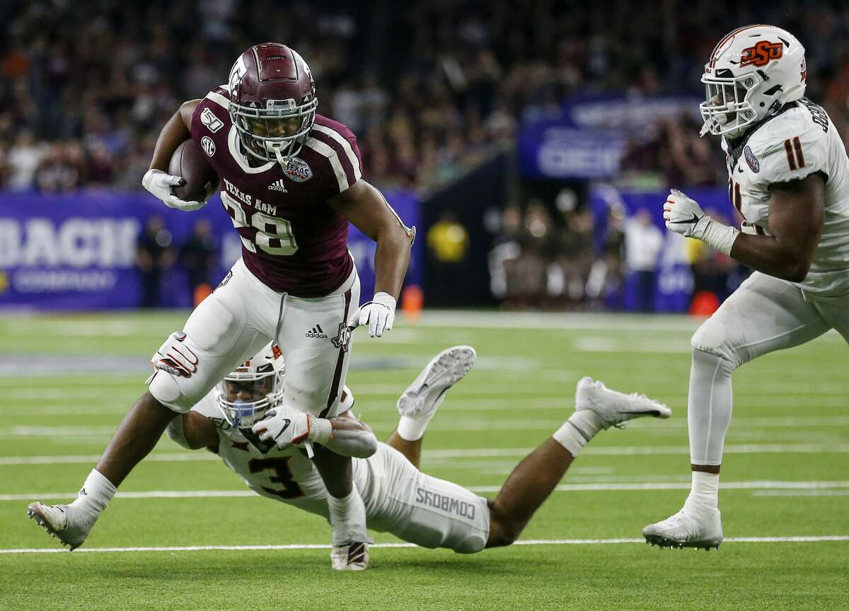 LOOK: Former Texas A&M Aggies Running Back Isaiah Spiller in Full Los  Angeles Chargers Gear - Sports Illustrated Texas A&M Aggies News, Analysis  and More