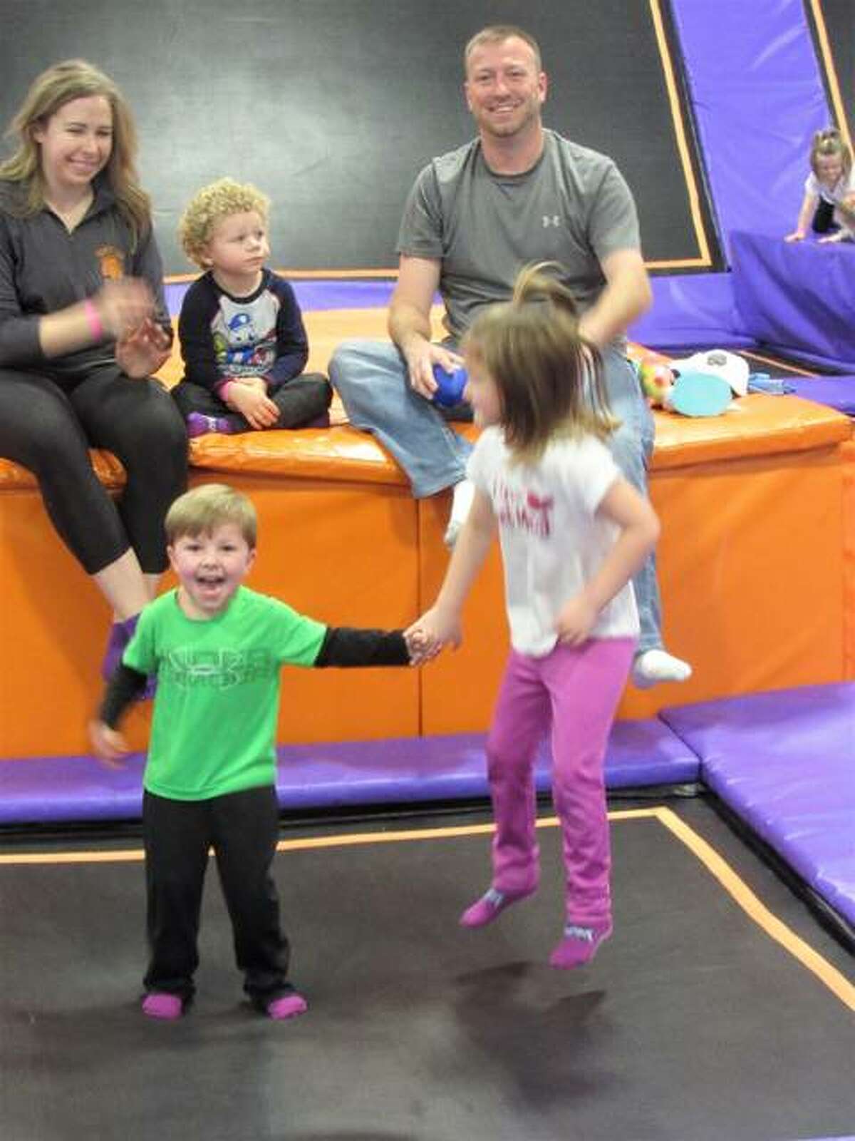 Jimmy Grant is shown with his son, Cooper, and his daughter, Gabbie, at Altitude Trampoline Park in Glen Carbon. He said the family usually spends 60 t0 90 minutes at the trampoline park and the kids usually are “worn out” by the end of their time there.