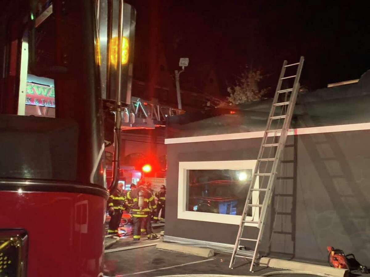 Fire officials are investigating an early morning fire Sunday inside a barbershop set to open in the coming weeks. The cause is not yet known.