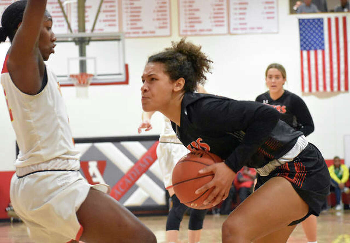 Edwardsville forward Maria Smith powers up before attempting a shot in the first half Saturday against Incarnate Word in the championship game of the Visitation Christmas Tournament.