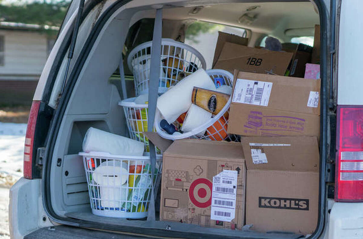 A van is loaded with laundry baskets, household items, personal toiletries, paper products and more, ready for delivery through Riverbend Christmas Outreach.