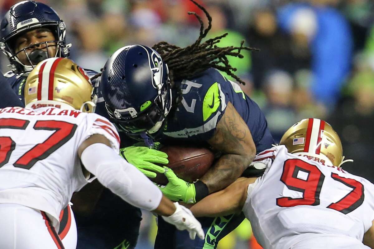Marshawn Lynch plows into San Francisco 49ers during a game, Dec. 29, 2019.