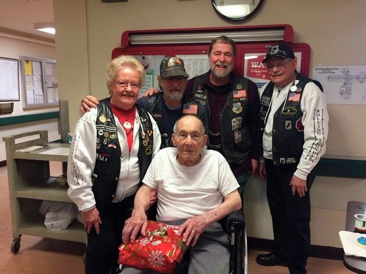 Each year, members of Rolling Thunder Inc. Chapter 1 provide Christmas gifts to local veterans during the holiday season. (Courtesy Photo)