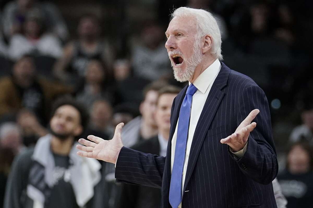 San Antonio Spurs coach Gregg Popovich yells at a referee during the second half of the team's NBA basketball game against the Brooklyn Nets, Thursday, Dec. 19, 2019, in San Antonio. San Antonio won 118-105. (AP Photo/Darren Abate)