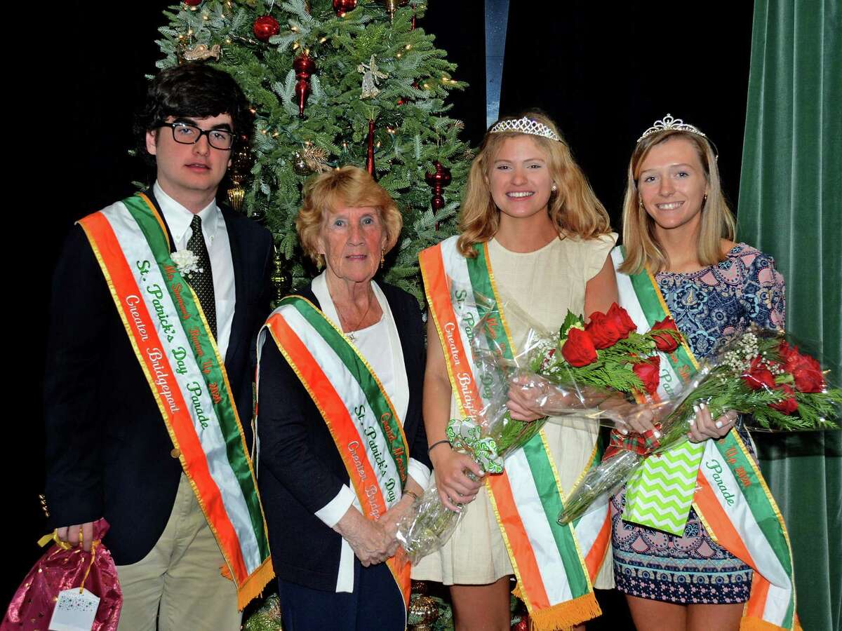 From left, Mr. Shamrock runner-up Jack Clyne, Parade Grand Marshal Mary Ann Doonan, Miss Shamrock Mary Feeney and Miss Shamrock runner-up Bridget Keary at a recent ceremony at the Gaelic American Club. Mr. Shamrock Seamus Carolan was absent from the photo due to being at a game with his hockey team.