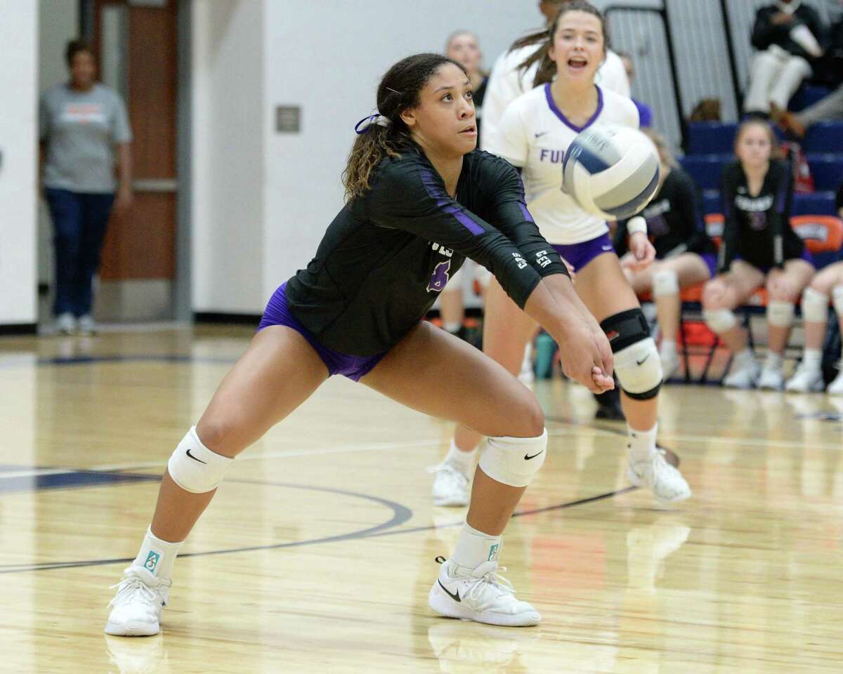 Alexis Dacosta (8) of Fulshear digs for a ball during last season’s volleyball playoffs. Fulshear won its bi-district playoff game this year.