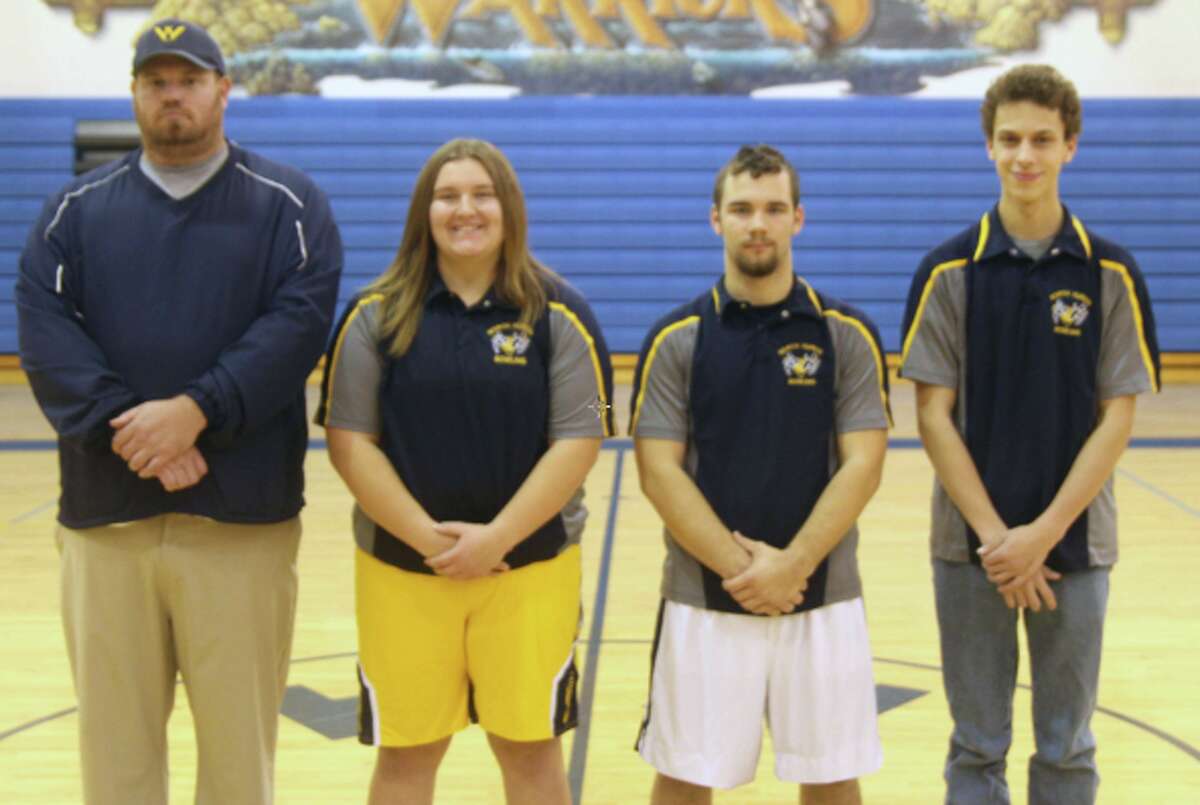 The 2019-2020 North Huron bowling team is, from left, head coach Jason Pierce, Patricia Pineau, Christian Brown and Kody Spicer.