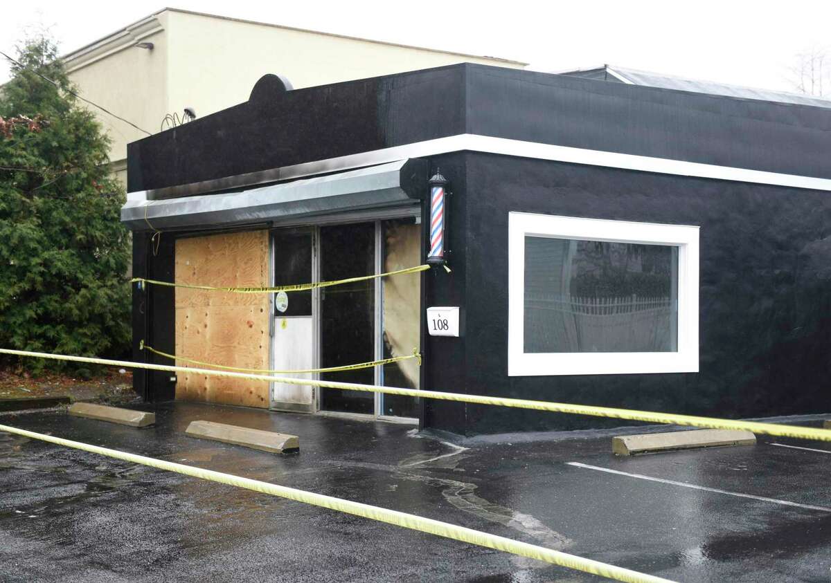 A building at 108 Connecticut Ave. in Norwalk, Conn. is damaged on Monday, Dec. 30, 2019 after a fire ripped through early Sunday morning. The structure, which was set to open up soon as a barber shop, sits across the street from the fire department and was put out quickly once firefighters gained entry.