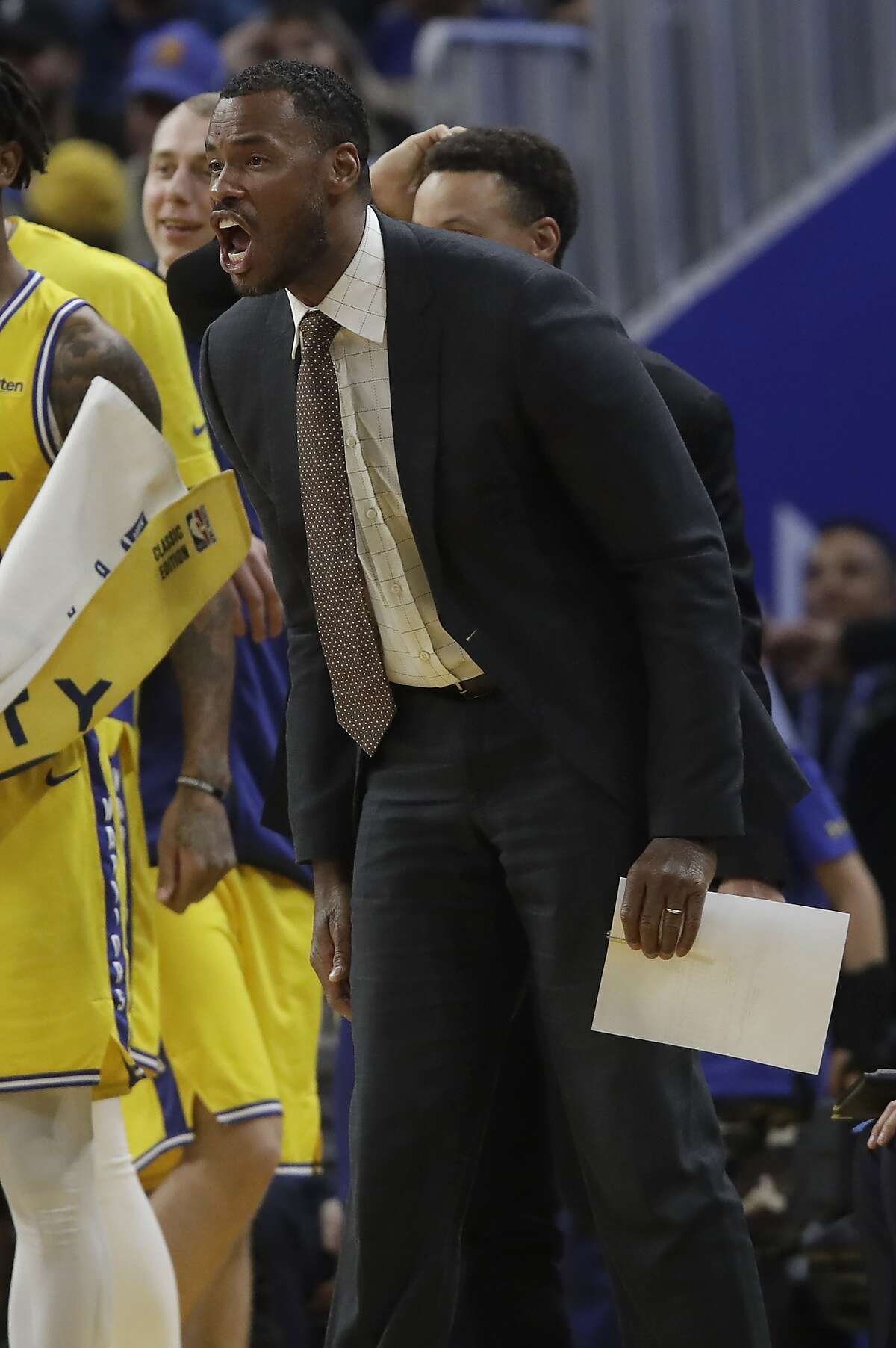 Golden State Warriors assistant coach Jarron Collins against the Phoenix Suns during an NBA basketball game in San Francisco, Friday, Dec. 27, 2019. (AP Photo/Jeff Chiu)