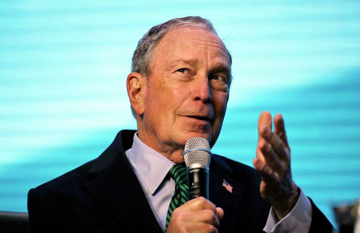 FILE - In this Dec. 11, 2019 file photo, Democratic presidential candidate and former New York City Mayor Michael Bloomberg gestures while taking part at the American Geophysical Union fall meeting in San Francisco. A top California Democratic Party official is leaving his post to run Bloomberg's presidential operation in the state. Bloomberg's campaign announced Tuesday, Dec. 24, that Chris Masami Myers will lead the billionaire businessman's campaign in California starting next month. (AP Photo/Eric Risberg, File)