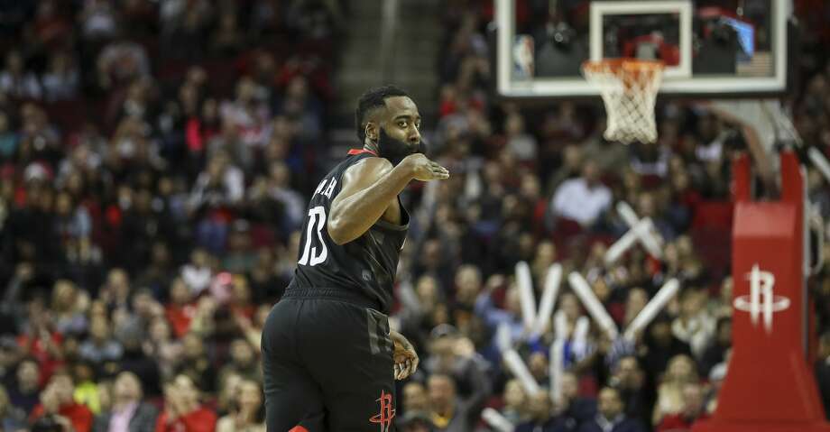 Houston Rockets guard James Harden (13) celebrates after making a 3-pointer during the second quarter of an NBA game at the Toyota Center on Tuesday, Dec. 31, 2019, in Houston. Photo: Jon Shapley/Staff Photographer