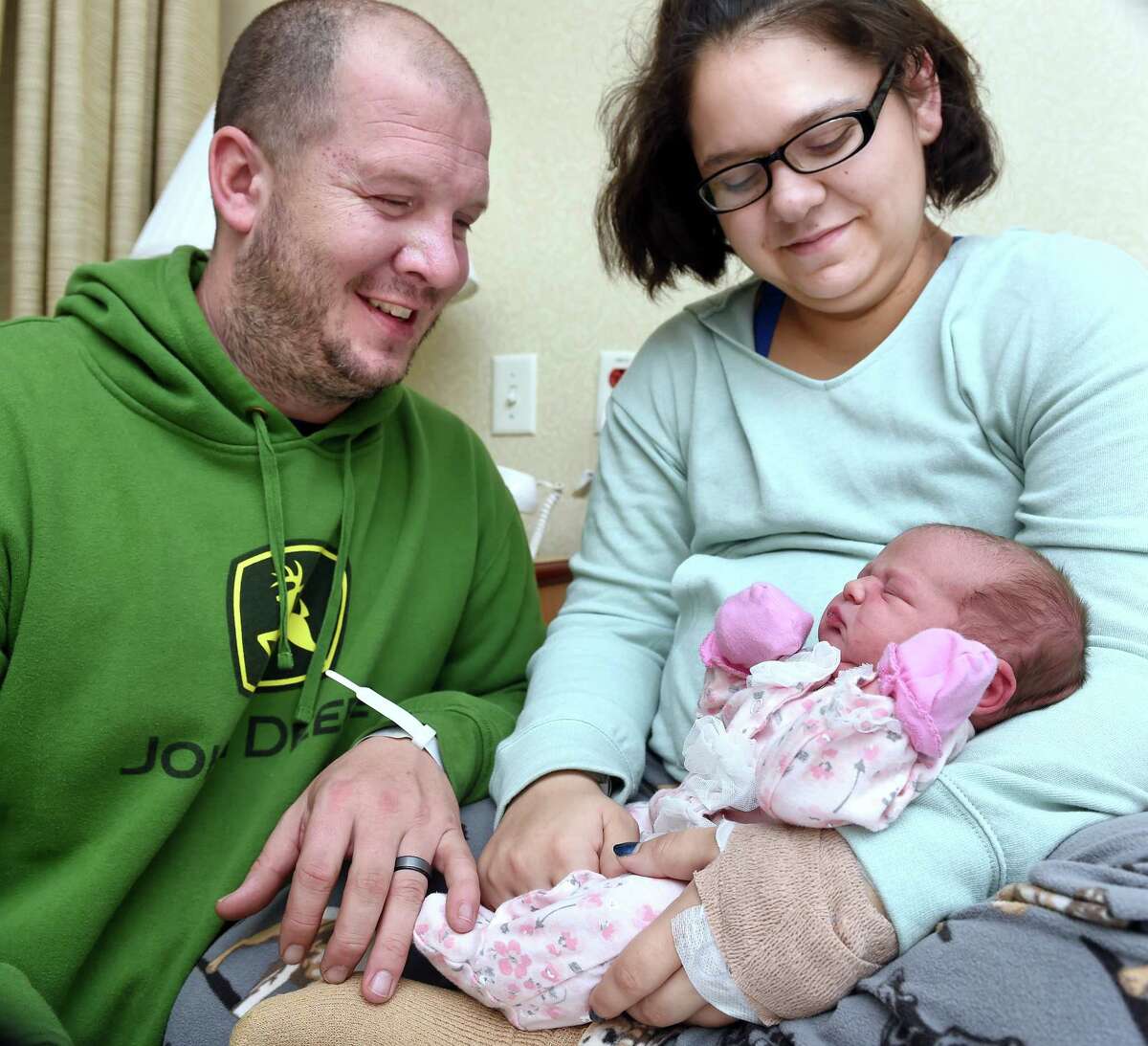 Dave and Taylor Venice of Woodbridge are photographed with their newborn daughter, Arabella, who was born at 12:04 a.m. on New Year's Day January 1, 2020 at the Childbirth Center at Griffin Hospital in Derby. Arabella weighs 8 lb. 6 oz. and is 20.5 inches.