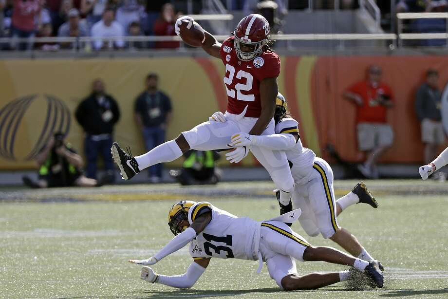 Alabama blitzes Michigan; Minnesota surprises Auburn - SFGate