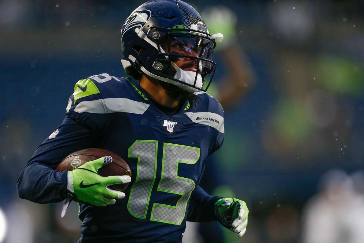 Seattle Seahawks wide receiver John Ursua walks off the field after News  Photo - Getty Images